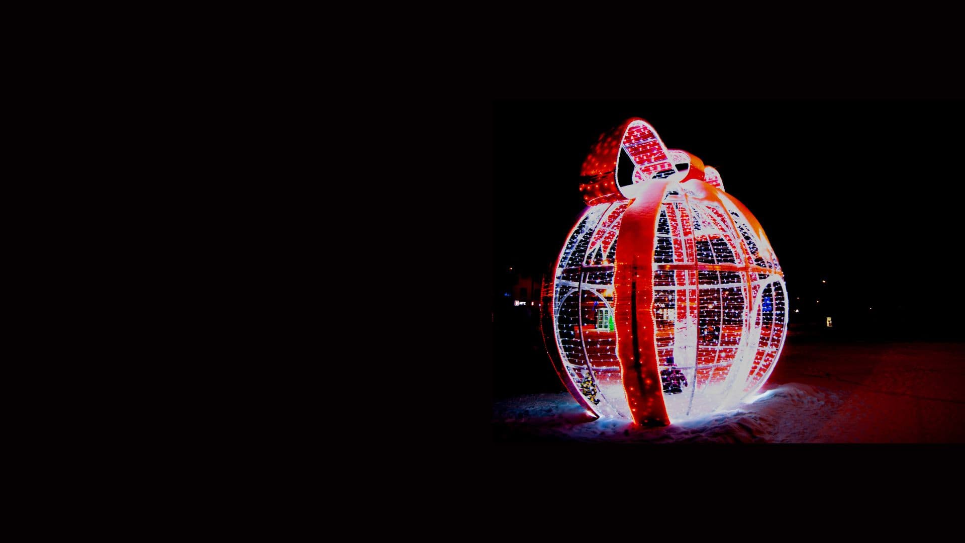 Giant lighted Christmas ornament display for commercial holiday installation