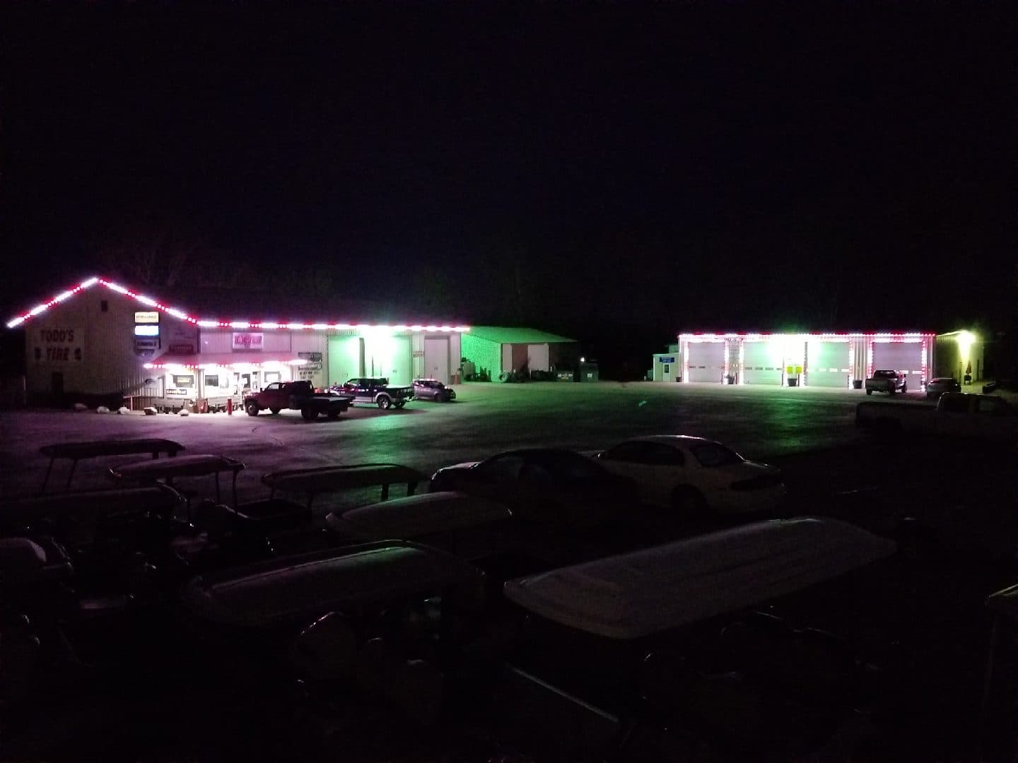 Tire shop complex with full roofline Christmas light installation
