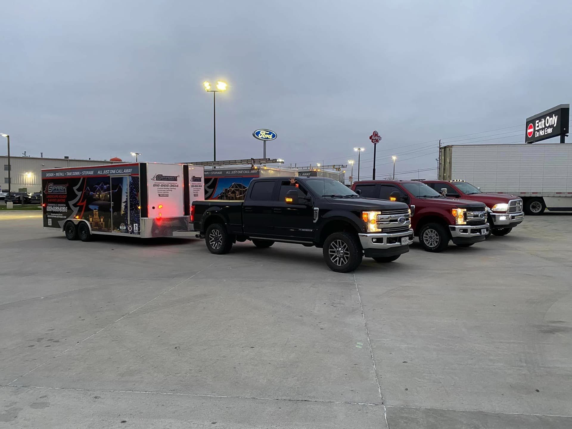 Spark Lighting KC team and work trucks